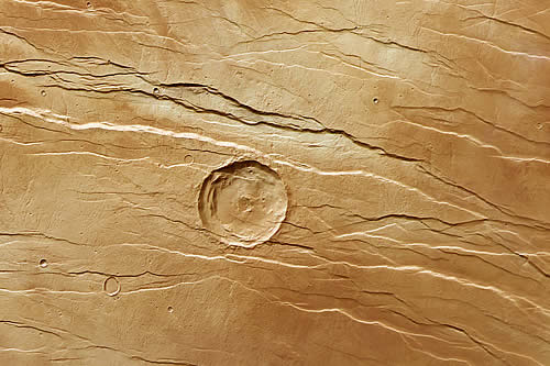 Nuevas imágenes muestran fosas parecidas a 'marcas de garras' sobre la superficie de Marte 